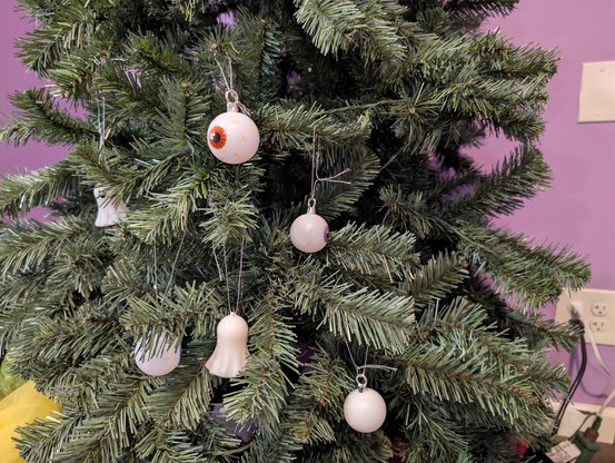 Artificial Christmas tree decorated with ghosts and eyeballs