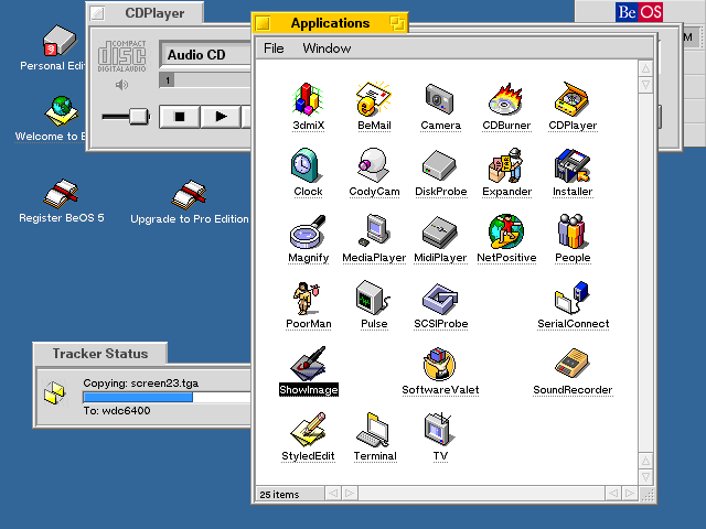 A screenshot of a gloriously colourful BeOS desktop, with a blue background, vibrant yellow window title bars, and colourful isometric icons